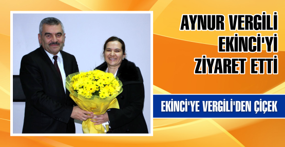 Ak Parti Körfez Belediye Başkan Aday Adayı Aynur Vergili Körfez İlçe Milli Eğitim Müdürü Hurşit Ekinci'yi ziyaret etti