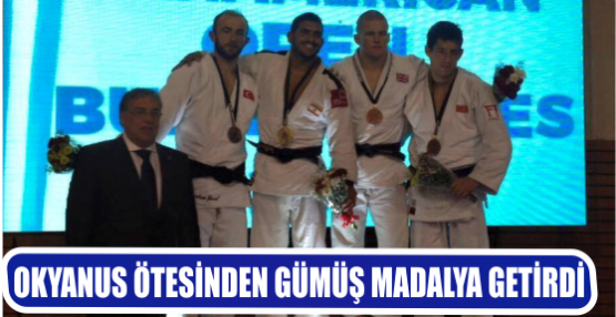 OKYANUS ÖTESİNDEN GÜMÜŞ MADALYA GETİRDİ 