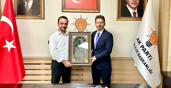 Erdemir, Okutan’a Tablo Hediye Etti