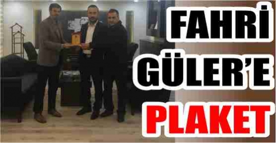 FAHRİ GÜLER'E PLAKET