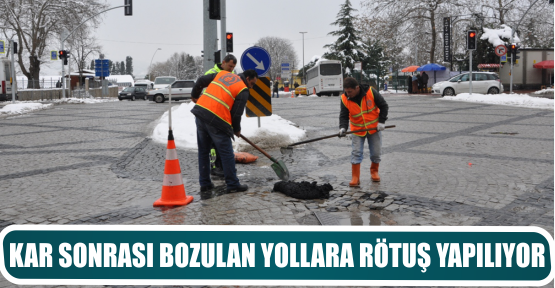 KAR SONRASI BOZULAN YOLLARA RÖTUŞ YAPILIYOR
